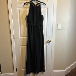 Black Gibson women’s jumpsuit with a gold bead around neck part. One worn once.